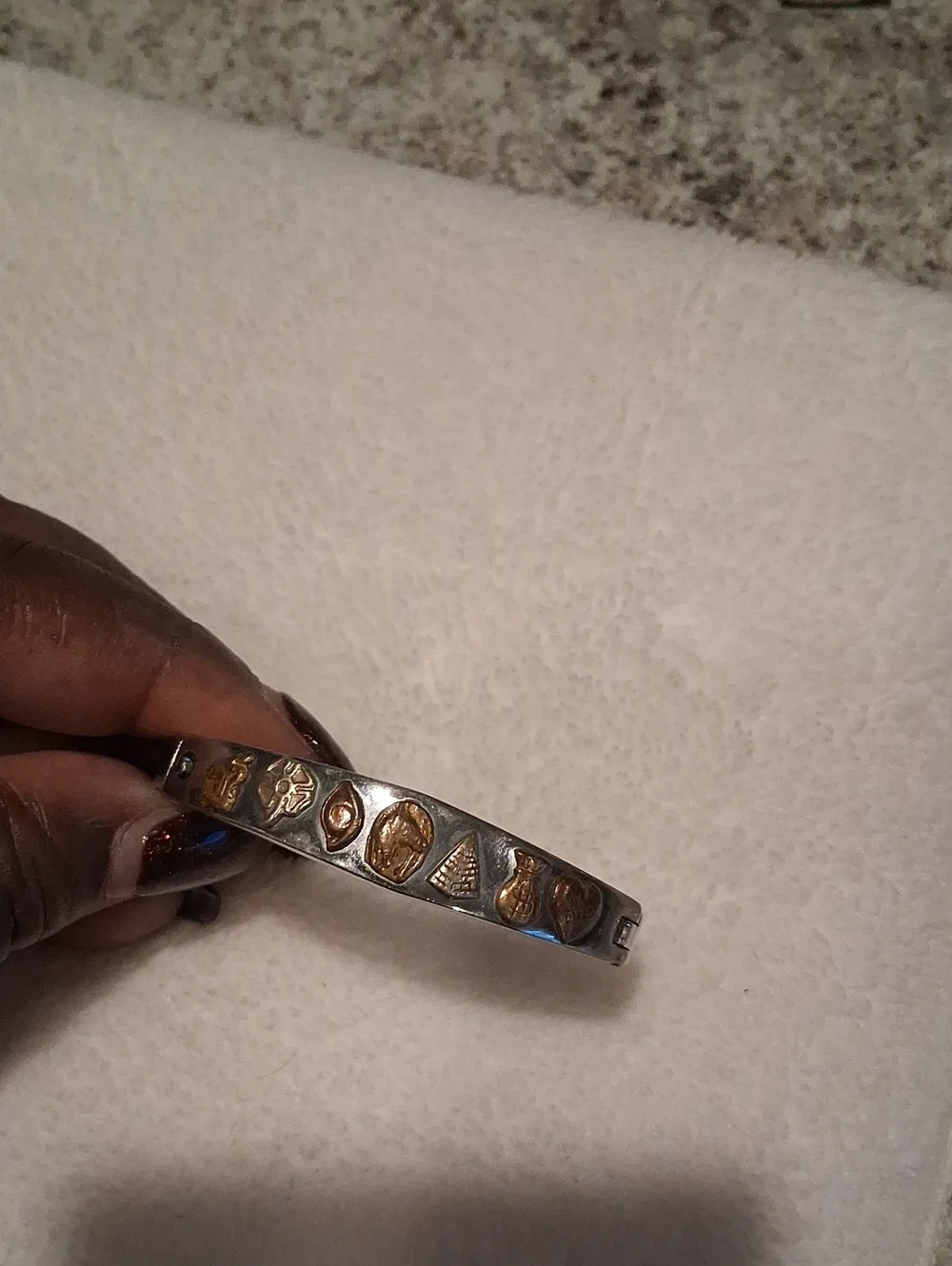 Silver-Tone Bangle Bracelet with Gold Accent Charms